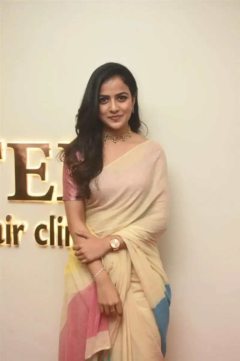 Vaishnavi Chaitanya in Yellow Saree at Hair Clinic Launch